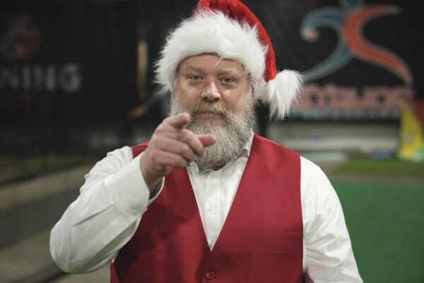 Brandon dressed as Santa for Christmas | BYoung Physical Therapy Happy Holidays from Your Physical Therapists in Cary, Apex, Raleigh, and Wake Forest